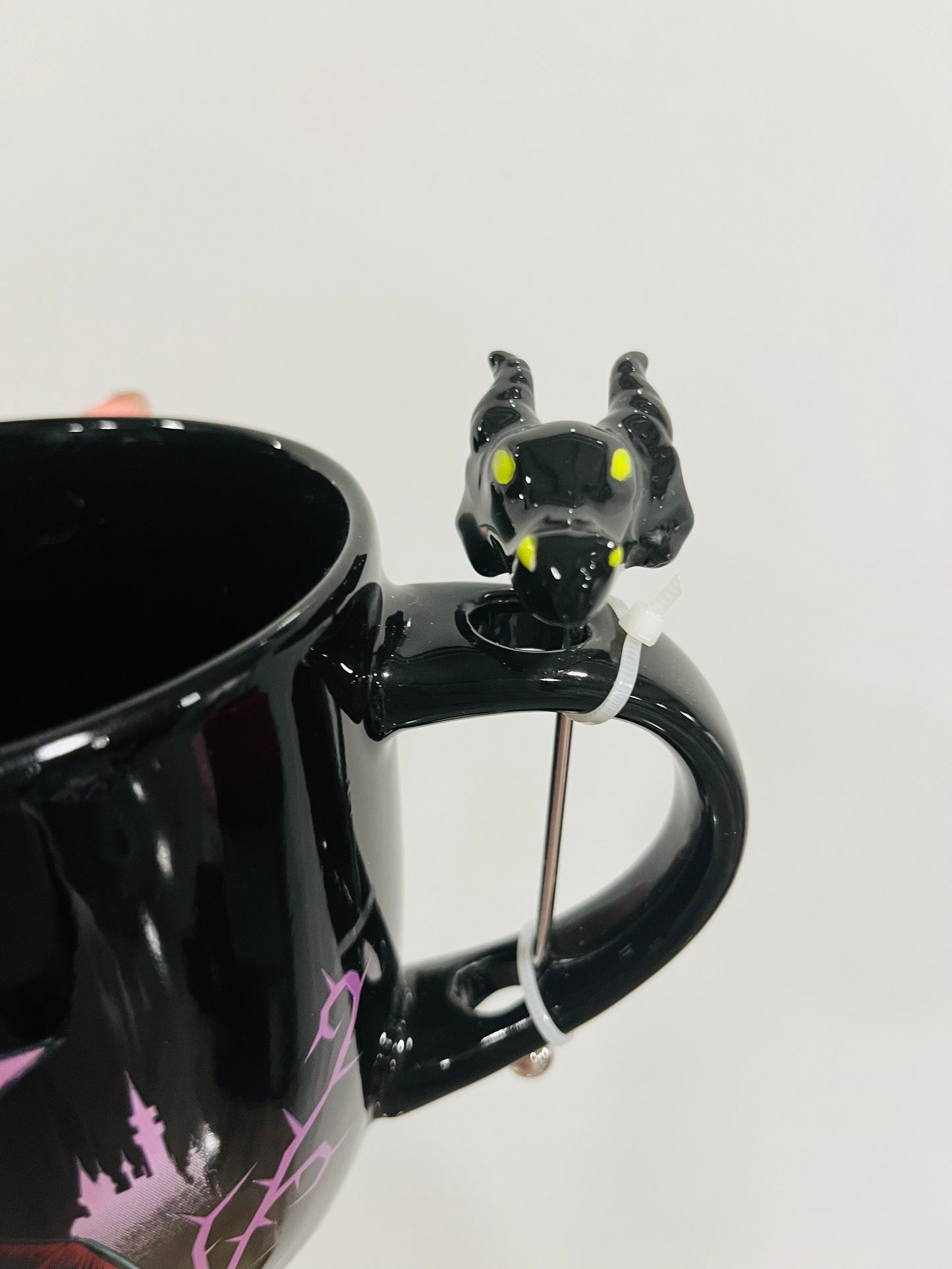 Mug Maléfica con revolvedor